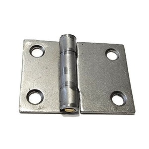 May include: A silver metal hinge with four holes and a brass pin. The hinge is closed.