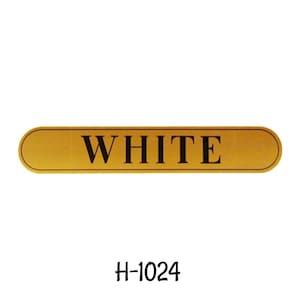 May include: A gold-colored rectangular label with the word "WHITE" printed in black letters. The label has a black border and the product code "H-1024" is printed below the label.