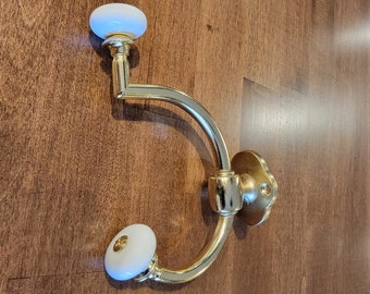 Bright Brass Cast Alloy- Double Front Mount Coat Hook with Porcelain Knobs