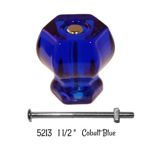 May include: Cobalt blue glass cabinet knob with a 1 1/2 inch screw. The knob is hexagonal in shape with a faceted design. The screw is silver in color. 5213 1 1/2" Cobalt Blue