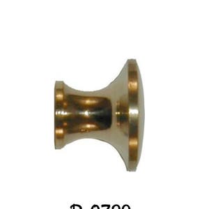 May include: A gold-toned metal knob with a round top and a cylindrical base. The knob has a smooth, polished finish.