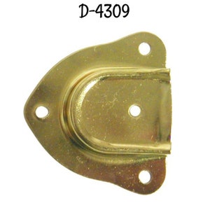 May include: A gold-colored metal plate with a curved opening and three holes. The plate is labeled "D-4309".
