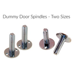 May include: Four metal door spindles in two sizes. Two spindles are short and have a round base with two holes. Two spindles are long and have a round base with two holes. The long spindles are threaded.