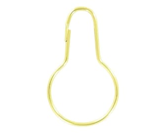 Large key ring or golf towel ring. Brass plated steel