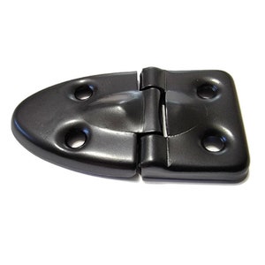 May include: Black metal hinge with a rounded, curved shape on one side and a rectangular shape on the other side. The hinge has four holes on each side.