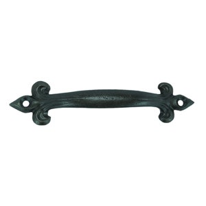 May include: Black cast iron door pull with a fleur-de-lis design on each end.