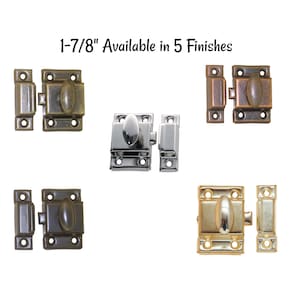 May include: Five different finishes of a 1-7/8 inch cabinet latch. The latches are made of metal and have a rectangular shape with a rounded knob. The finishes include antique brass, oil rubbed bronze, polished nickel, satin nickel, and polished brass.