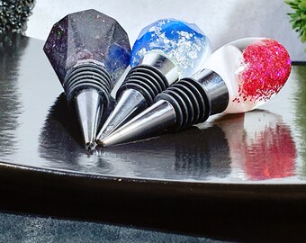 Decorative wine bottle stopper made of resin and stainless steel