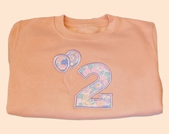 Kindergeburtstag-Sweatshirt: Kundenspezifischer Liberty of London-Stoff
