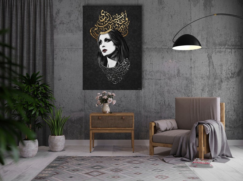 May include: A black and gold canvas print featuring a woman with a crown of Arabic calligraphy. The woman is looking to the side and has dark hair and eyes. The background is a dark gray.