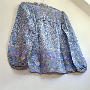 Vintage India Shirt In Featherweight Sheer Cotton Gauze With Pale Floral Print + Ethereal Balloon Sleeves | Deadstock. never been worn vintage Indian peasant blouse in pastel blues and violets. vintage Indian blouse. deadstock vintage India top. sheer cotton gauze India blouse. balloon sleeve India shirt. featherweight Indian gauze blouse. rare deadstock vintage India blouses. hand printed cotton Indian shirts.