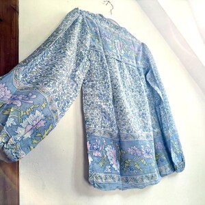 Vintage India Shirt In Featherweight Sheer Cotton Gauze With Pale Floral Print + Ethereal Balloon Sleeves | Deadstock. never been worn vintage Indian peasant blouse in pastel blues and violets. vintage Indian blouse. deadstock vintage India top. sheer cotton gauze India blouse. balloon sleeve India shirt. featherweight Indian gauze blouse. rare deadstock vintage India blouses. hand printed cotton Indian shirts.