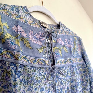 Vintage India Shirt In Featherweight Sheer Cotton Gauze With Pale Floral Print + Ethereal Balloon Sleeves | Deadstock. never been worn vintage Indian peasant blouse in pastel blues and violets. vintage Indian blouse. deadstock vintage India top. sheer cotton gauze India blouse. balloon sleeve India shirt. featherweight Indian gauze blouse. rare deadstock vintage India blouses. hand printed cotton Indian shirts.
