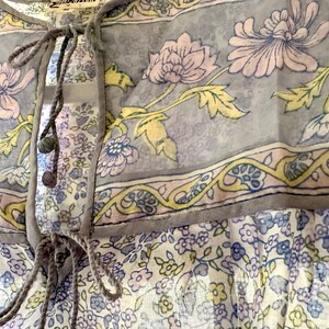 Vintage India Shirt In Featherweight Sheer Cotton Gauze With Pale Floral Print + Ethereal Balloon Sleeves | Deadstock. never been worn vintage Indian peasant blouse in pastel blues and violets. vintage Indian blouse. deadstock vintage India top. sheer cotton gauze India blouse. balloon sleeve India shirt. featherweight Indian gauze blouse. rare deadstock vintage India blouses. hand printed cotton Indian shirts.