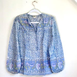 Vintage India Shirt In Featherweight Sheer Cotton Gauze With Pale Floral Print + Ethereal Balloon Sleeves | Deadstock. never been worn vintage Indian peasant blouse in pastel blues and violets. vintage Indian blouse. deadstock vintage India top. sheer cotton gauze India blouse. balloon sleeve India shirt. featherweight Indian gauze blouse. rare deadstock vintage India blouses. hand printed cotton Indian shirts.