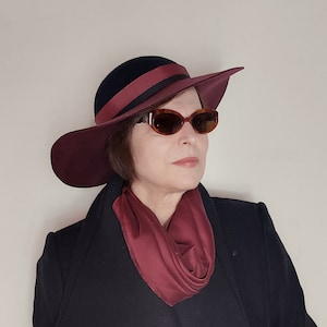 Black and burgundy hat