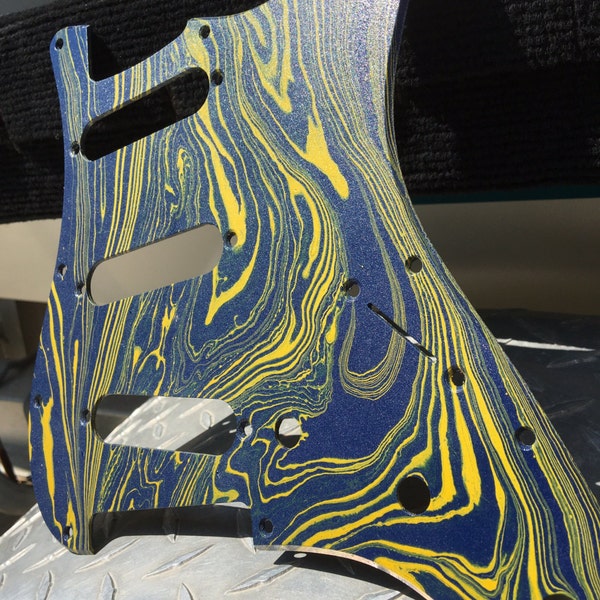 Stratocaster pickguard w/ Blue Lightning swirl