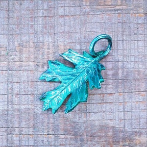 Hand forged iron oak leaf pendant Emerald green