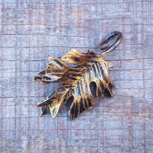 Hand forged iron oak leaf pendant Gold