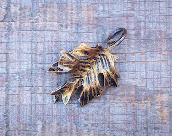 Hand forged iron oak leaf pendant