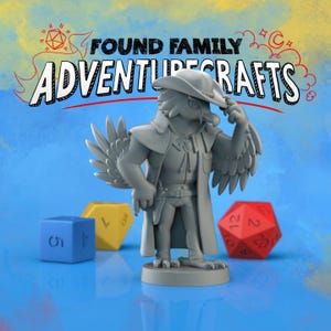 May include: A gray figurine of a bird-like character wearing a hat and coat, with the text "FOUND FAMILY ADVENTURE CRAFTS" above. Three colorful dice are in the foreground. A fun, fantasy-themed item.
