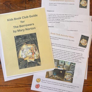 May include: A Kids Book Club Guide for The Borrowers by Mary Norton, featuring a cover image of the book. The guide includes comprehension questions for chapters 1-4, book club activity ideas, and suggestions for watching the 1997 movie adaptation.