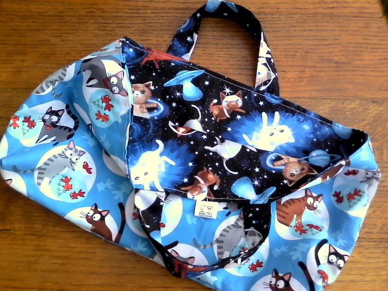 Fully reversible 100/% cotton bag with space cats one one side and the reverse side cats and goldfish