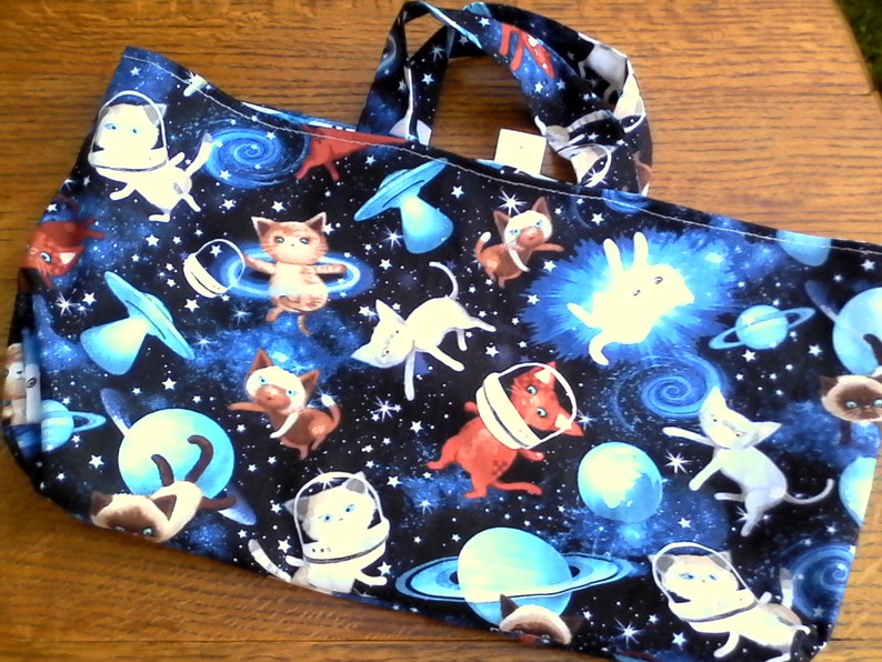 Fully reversible 100/% cotton bag with space cats one one side and the reverse side cats and goldfish