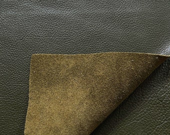 May include: A close-up of a dark green leather swatch with a folded corner revealing a lighter green suede side.