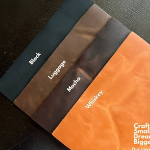 May include: Four leather samples in black, brown, dark brown, and orange. The samples are labeled "Black", "Luggage", "Mocha", and "Whiskey". The text "Craft Smaller, Dream Bigger" is visible in the bottom right corner of the image. The text "Our Loved Crazy Horse Leathers available in 8.5" by 11" Pre Cut Sheets" is also visible.