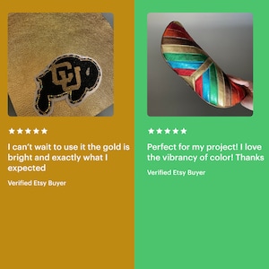 May include: A gold-colored leather patch with a beaded design of a buffalo with the letters "CU" inside. The patch is on a gold-colored background.