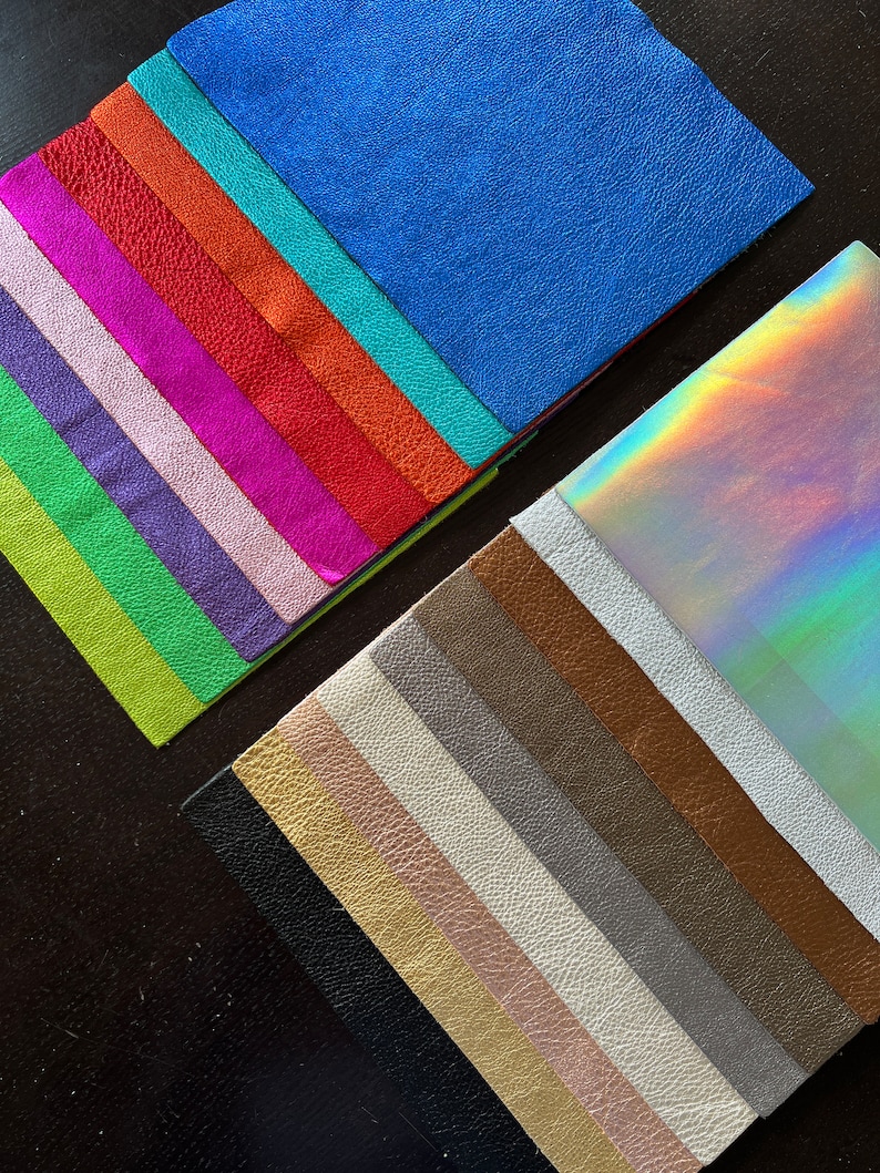 Our Loved Metallic Natural Grain Leathers available in 8.5" by 11" Pre Cut Panels

Black
Gold
Rose Gold
Platinum
Gunmetal
Pewter
Bronze
Silver
Silver Iridescent
Lime Green
Emerald Green
Purple
Pink
Hot Pink
Red
Orange
Turquoise
Royal Blue