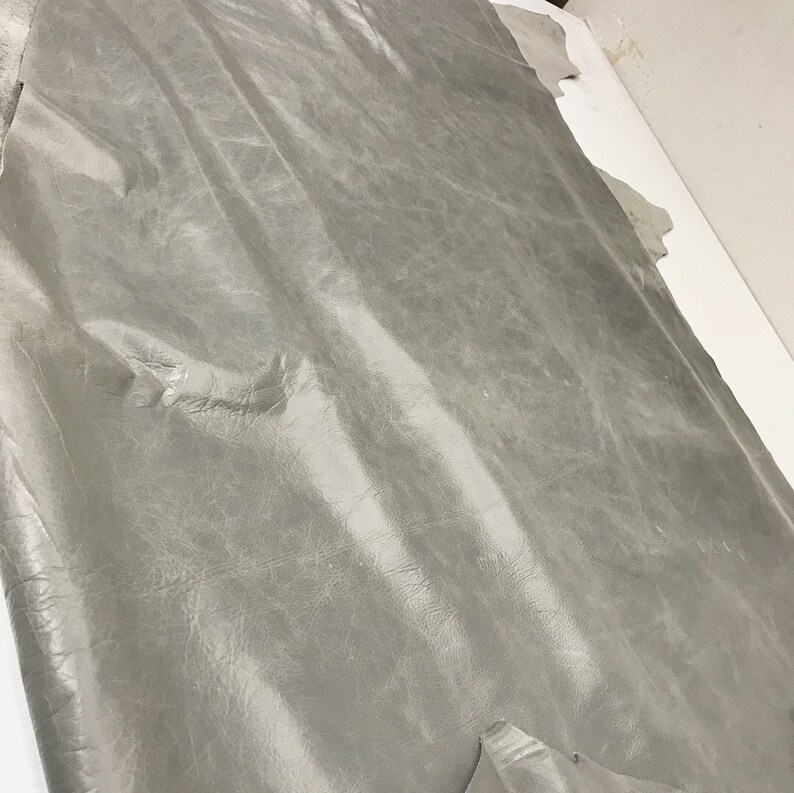 1.1-1.3 mm Distressed Leather 2 skins available Granite Cow Leather with a Waxy Pull Up Finish 3 OZ