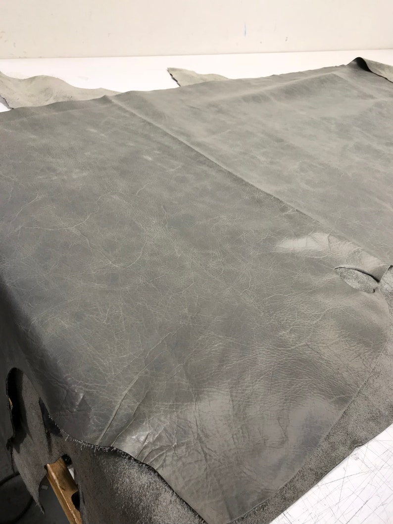 1.1-1.3 mm Distressed Leather 2 skins available Granite Cow Leather with a Waxy Pull Up Finish 3 OZ