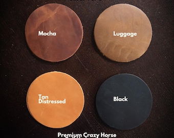 May include: Four round leather coaster blanks in various colors: mocha, luggage, tan distressed, and black. The text on the coasters reads "Mocha", "Luggage", "Tan Distressed", and "Black". The text "Leather Coaster Blanks Set of 4 or 6" is also visible.