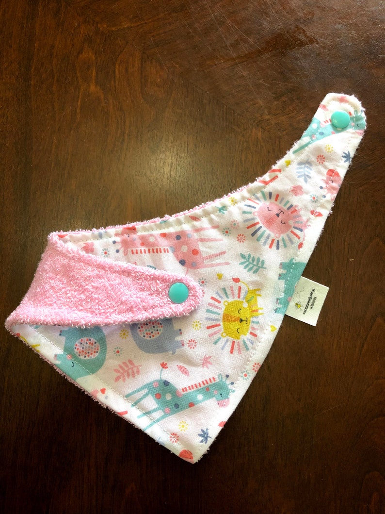 Bandana Bibs are stylish made with cotton fabric that are soft and absorbent.