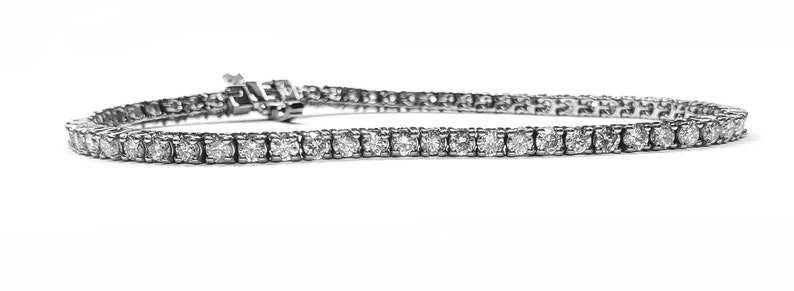 Diamond Tennis Bracelet 3.79cts. 4 Prong Setting in 14kt. White Gold 7"