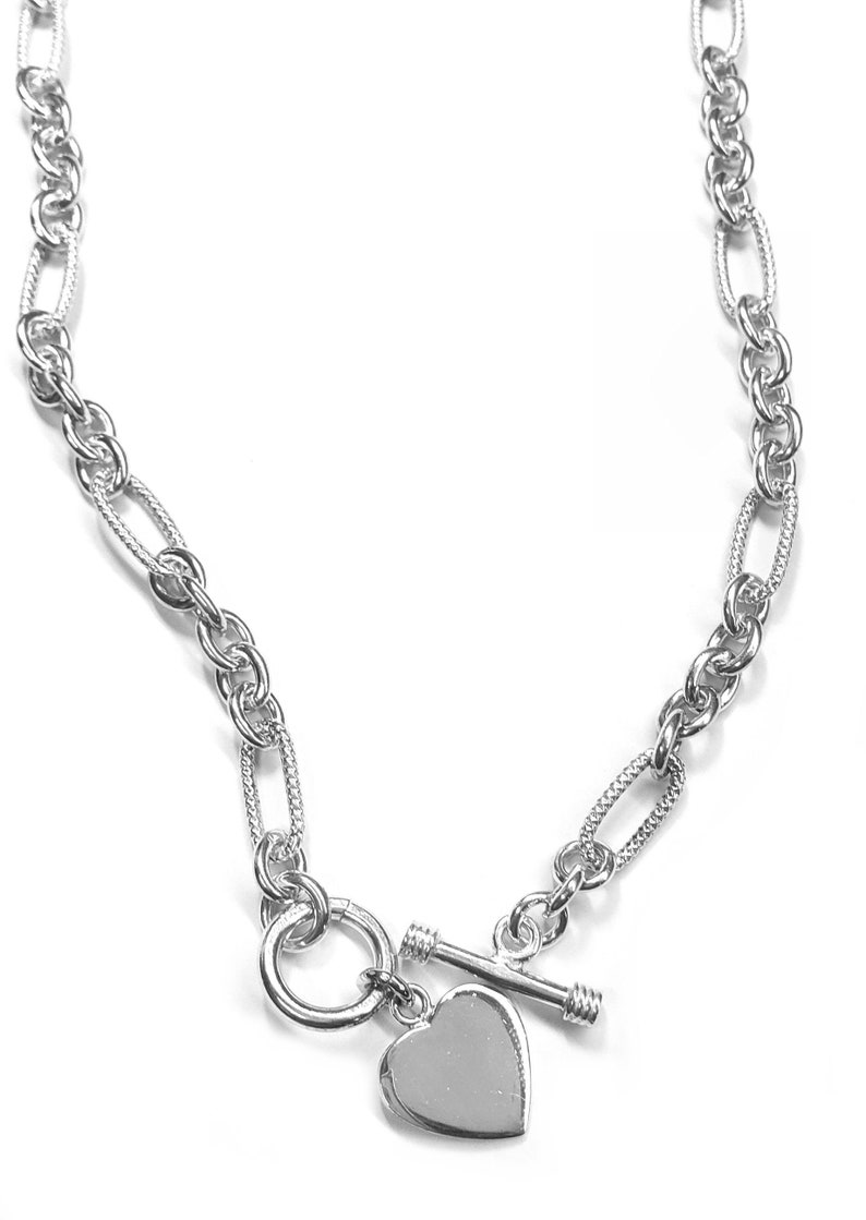 Sterling Silver Necklace, Oval/Round Pattern With Heart Charm & Toggle Clasp