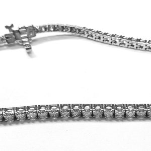 Diamond Tennis Bracelet 3.79cts. 4 Prong Setting in 14kt. White Gold 7"