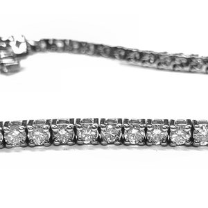 Diamond Tennis Bracelet 3.79cts. 4 Prong Setting in 14kt. White Gold 7"