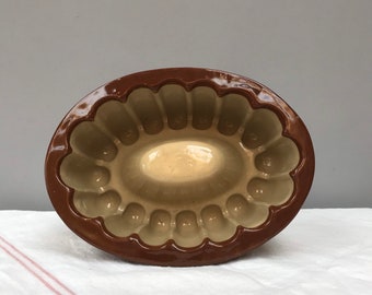 Vintage French pottery oval cake mold Earthenware glazed baking. Tactile beige earthenware pottery