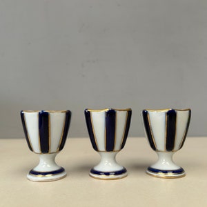 Trio of Camille Tharaud Limoges Porcelain elegant pure white and dark blue gold gilt art deco egg cups Vintage French porcelaine