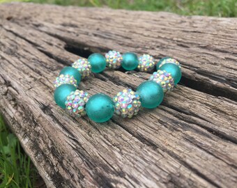 Stretch turquoise glass bead and rhinestone bead bracelet