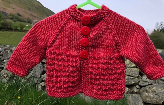 newborn red cardigan