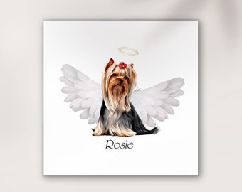 May include: A digital illustration of a Yorkshire Terrier with white angel wings and a halo. The dog is brown and black with a red bow. The dog's name, "Rosie", is written below the image.