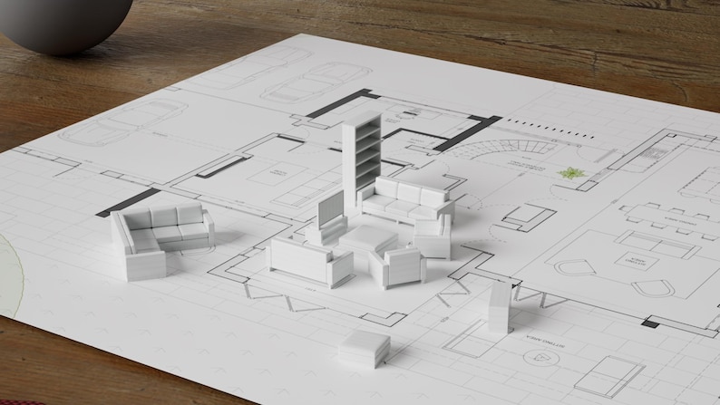 Puede incluir: Una casa modelo blanca con muebles colocados en un plano. Los muebles incluyen un sof&aacute;, una estanter&iacute;a, una mesa de centro y sillas.