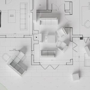 Puede incluir: Un plano blanco con piezas de mobiliario en miniatura colocadas sobre &eacute;l. El plano muestra la planta de una casa con diferentes habitaciones y la colocaci&oacute;n de los muebles.