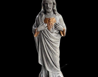 Concrete Jesus with sacred heart statue