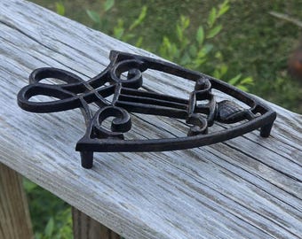 Dessous de plat vintage en fonte