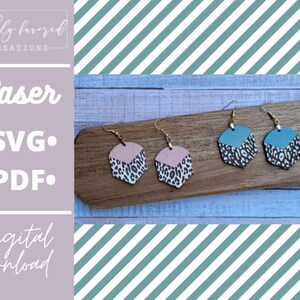 May include: Two pairs of geometric earrings with a pink and blue color scheme. The earrings are made of wood and have a leopard print design. The earrings are on a wooden surface. The text "Laser SVG PDF digital download" is on the left side of the image.
